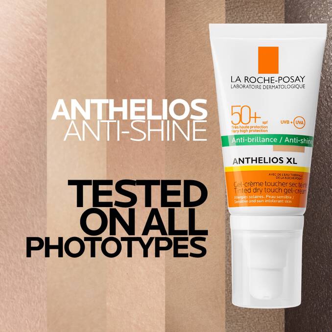 La Roche-Posay Anthelios XL sunscreen tube on a striped background with text about phototypes.