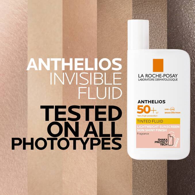 La Roche-Posay Anthelios sunscreen bottle with text on a striped background