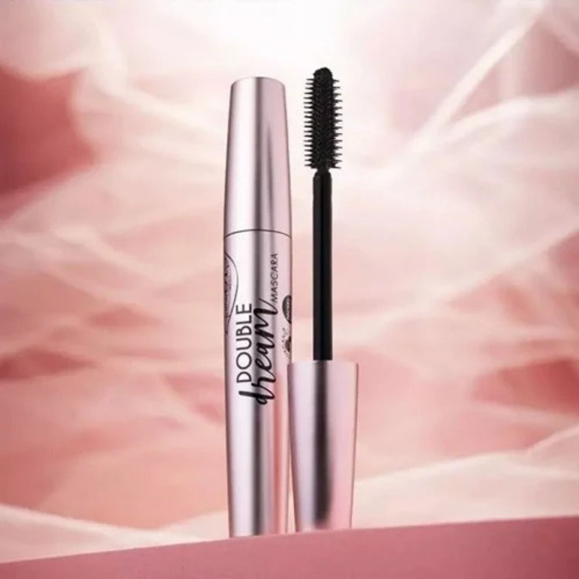 PuroBIO Double Dream Mascara & Eyeliner with silver and black design on a pink background