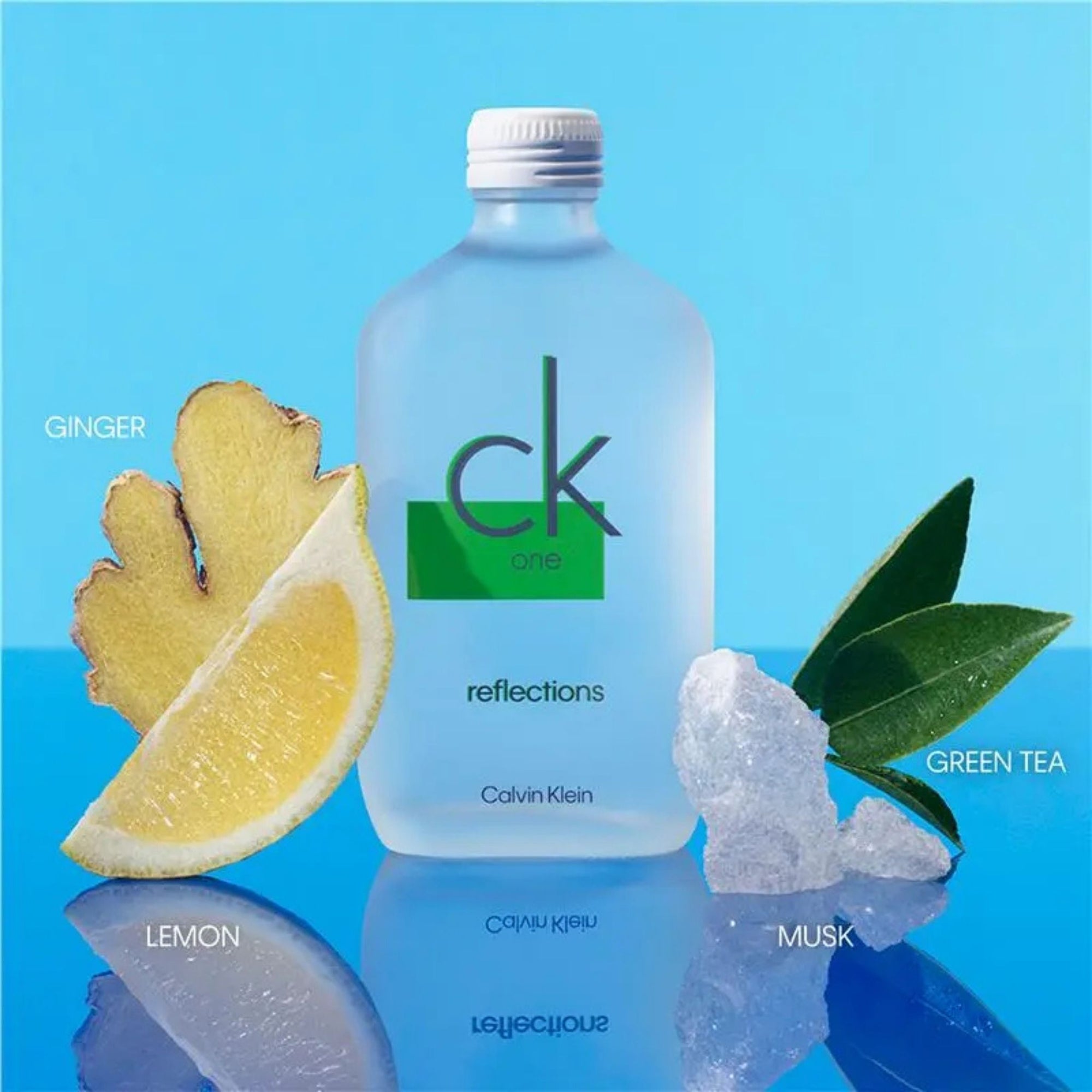 Calvin Klein One Reflections bottle with ginger, lemon, green tea, and musk elements on a blue background